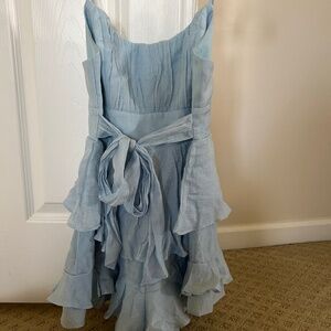 Baby blue romper gauze material. Very elegant.